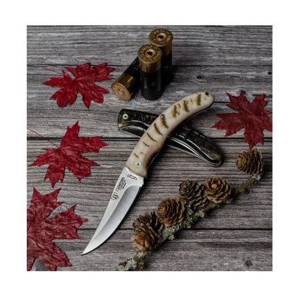 CUDEMAN - FOLDING SKINNER 8.5CM CLIP-POINT, RAM BONE HANDLE (374-M)
